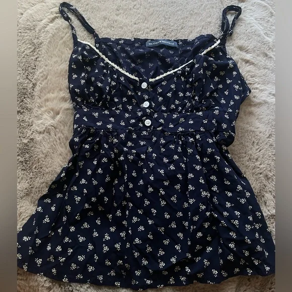 Navy blue floral flow top from Brandy Melville, floral print and cream roses. - Picture 1 of 2